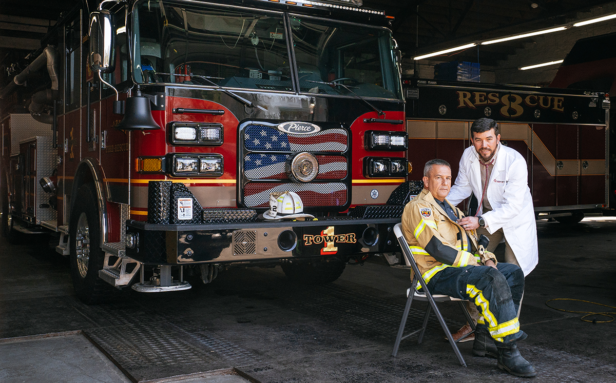 medical provider treating a fire fighter patient